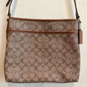 Like new! Authentic Coach leather messenger bag.